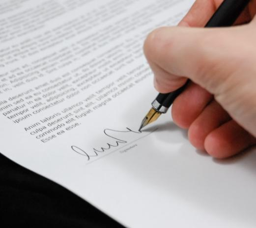 Signing funeral arrangement paperwork